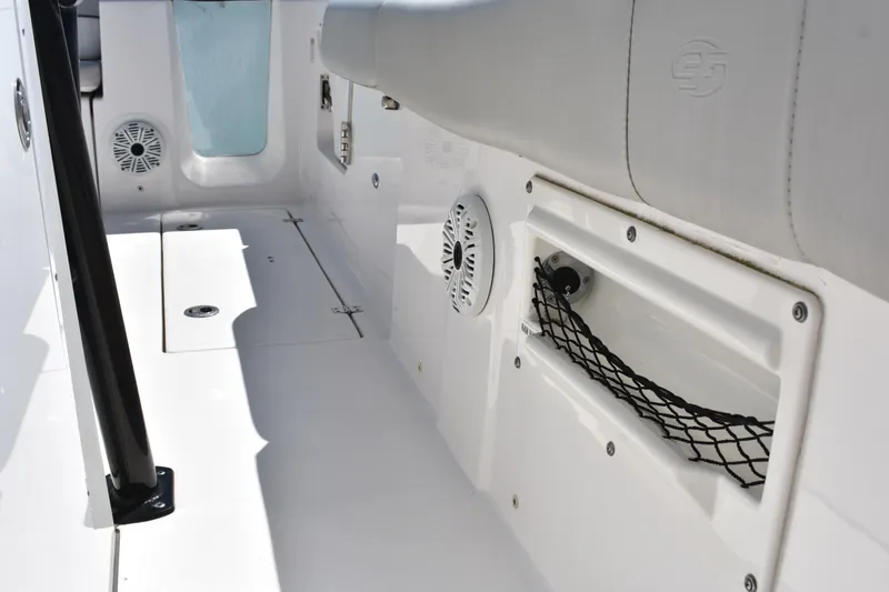 Slide: The Image of Interior view of 2021 Sea Fox 268 Commander boat, featuring seating and storage compartments. - 30