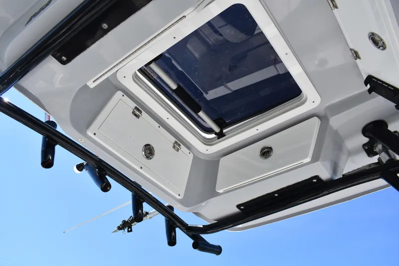 Slide: The Image of 2021 Sea Fox 268 Commander boat roof with hatch and rod holders. - 37