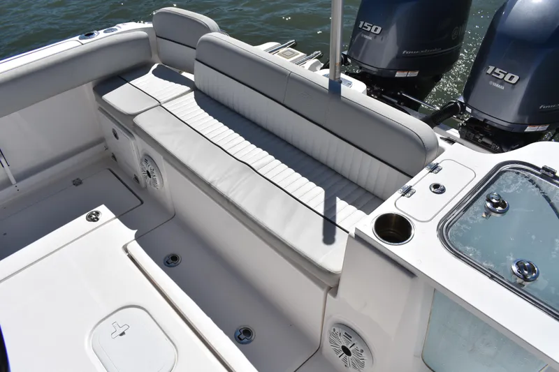 Slide: The Image of 2021 Sea Fox 268 Commander boat interior with seating and twin Yamaha engines. - 44
