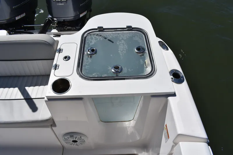 Slide: The Image of 2021 Sea Fox 268 Commander boat deck with seating and storage compartment. - 49