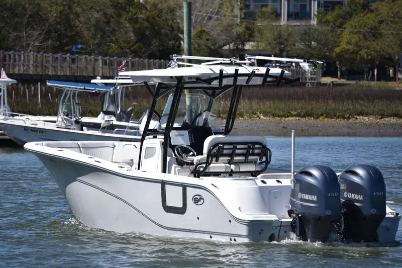 Slide: The Image of 2021 Sea Fox 268 Commander boat with dual Yamaha engines on water. - 6