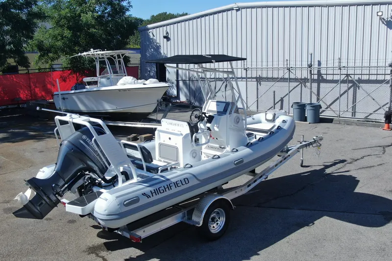 Slide: The Image of 2025 Highfield Sport 560 boat with modern design and advanced navigation system. - 4