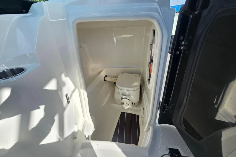 Slide: The Image of 2017 Monterey M-45 boat interior with compact marine toilet. - 18