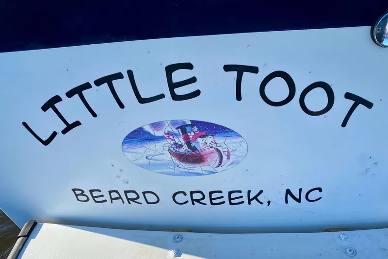 Slide: The Image of Boat name "Little Toot" with illustration, Beard Creek, NC, Outer Reef 26/31, 1979. - 10