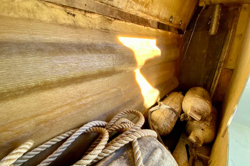 Slide: The Image of Interior of 1979 Outer Reef 26/31 boat with ropes and fenders. - 108