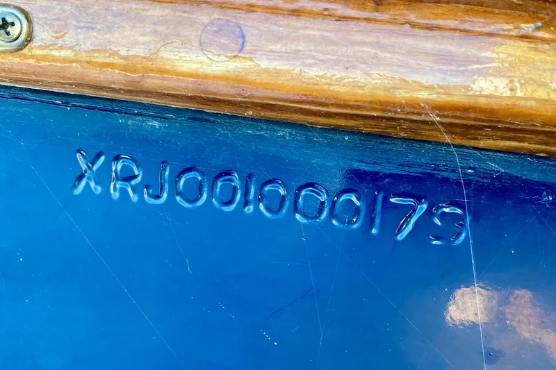 Slide: The Image of Hull identification number on blue Outer Reef 26/31 boat, 1979 model. - 119