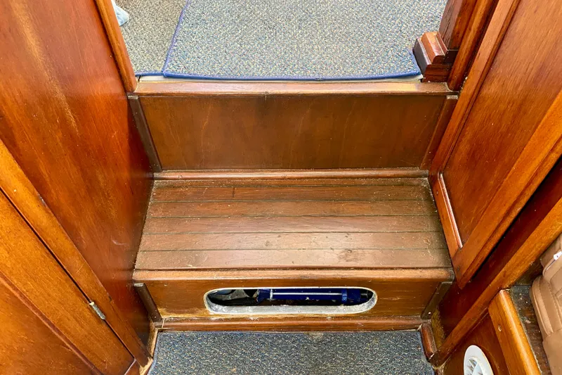 Slide: The Image of Wooden interior step of 1979 Outer Reef 26/31 boat, featuring rich wood finish. - 68