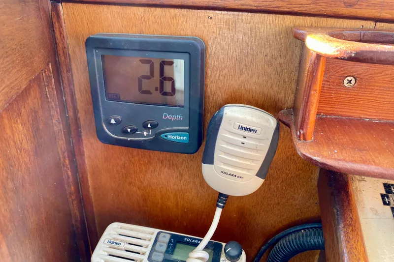 Slide: The Image of Depth gauge and radio equipment on a 1979 Outer Reef 26/31 boat. - 80