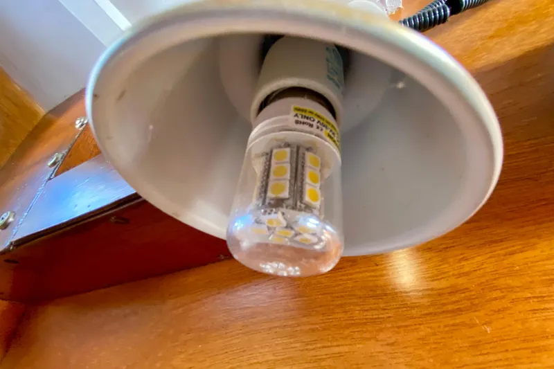 Slide: The Image of LED bulb in a vintage Outer Reef 26/31 lamp fixture, 1979 model. - 91