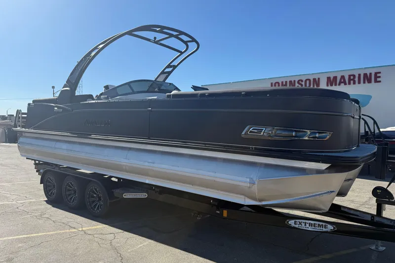 The Image of 2026 Avalon 2785 QL pontoon boat on trailer at Johnson Marine. - 0