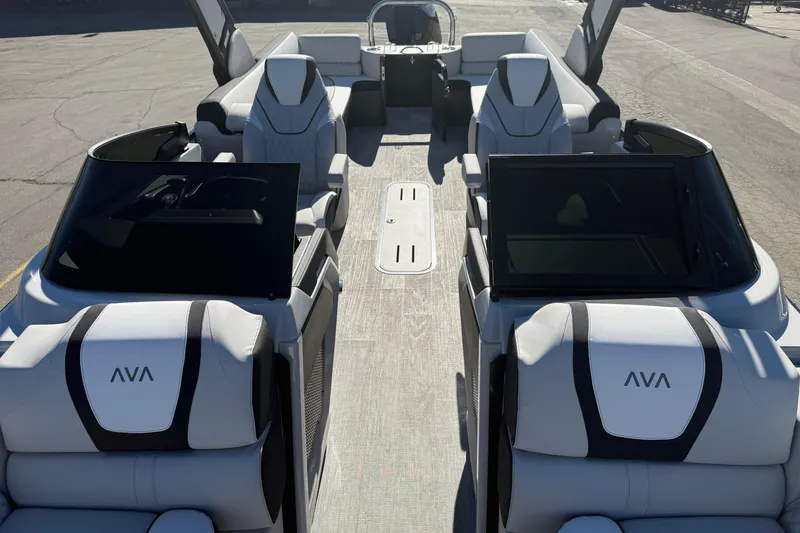 Slide: The Image of 2026 Avalon 2785 QL boat interior with modern seating and sleek design. - 7