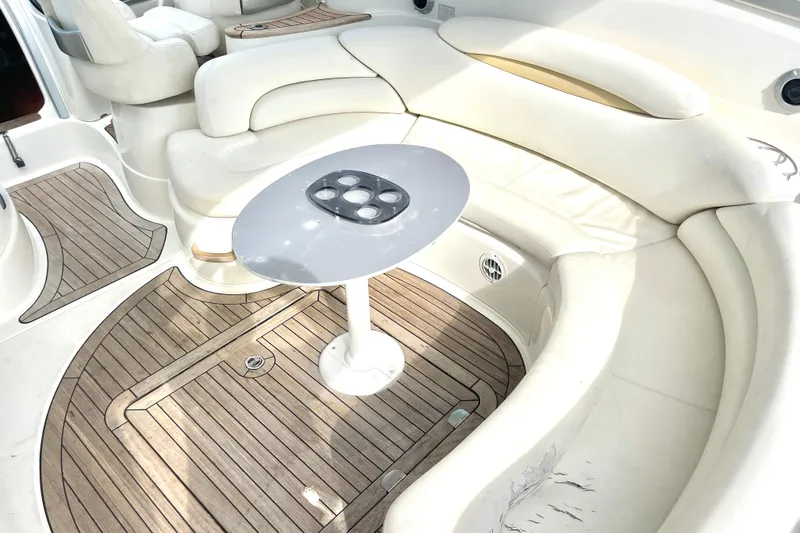 Slide: The Image of Luxurious 2006 Cranchi Mediterranee 50 HT yacht interior with elegant seating and wooden flooring. - 12