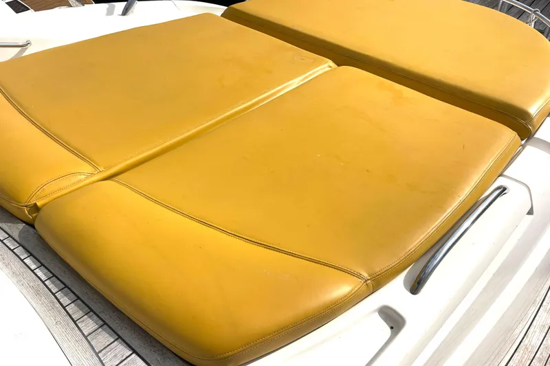 Slide: The Image of Yellow sunpad on 2006 Cranchi Mediterranee 50 HT yacht deck. - 16