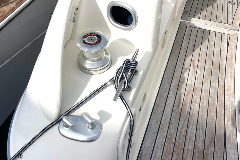 Slide: The Image of 2006 Cranchi Mediterranee 50 HT yacht deck with winch and rope detail. - 17