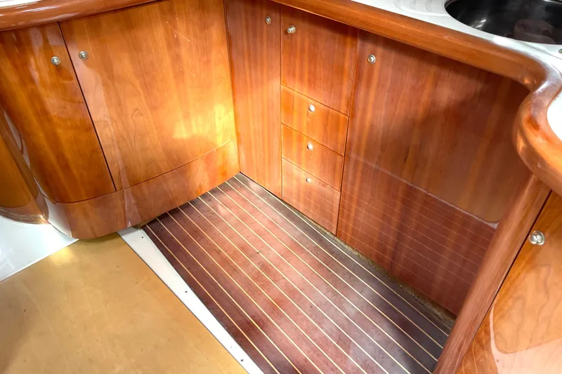 Slide: The Image of Luxurious wooden interior of 2006 Cranchi Mediterranee 50 HT yacht kitchen. - 4