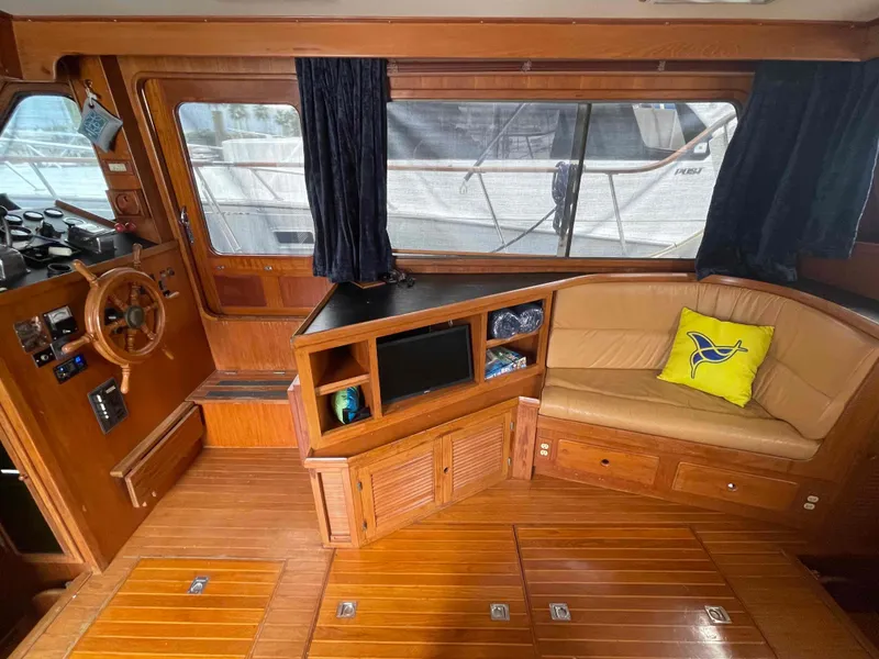 Slide: The Image of Interior of a 1986 Kha Shing Spindrift yacht with wooden furnishings. - 19