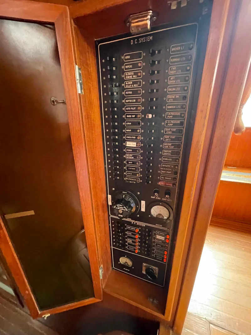 Slide: The Image of 1986 Kha Shing Spindrift yacht helm with wooden steering wheel. - 26