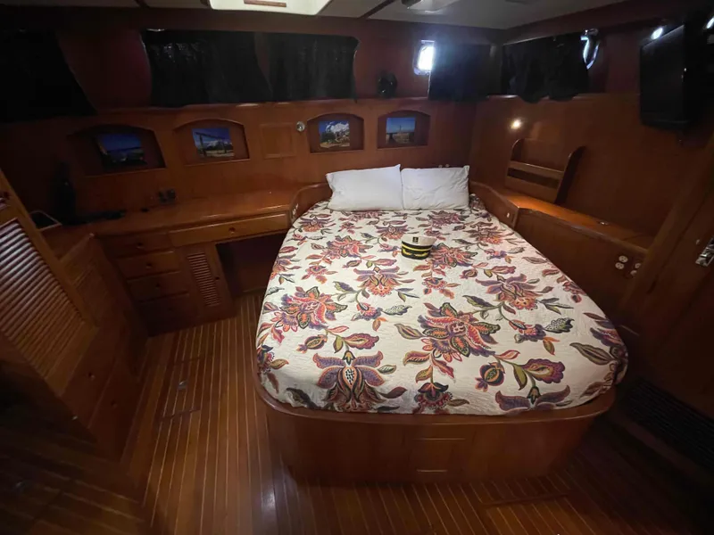 Slide: The Image of Interior of a 1986 Kha Shing Spindrift yacht with double bed. - 32