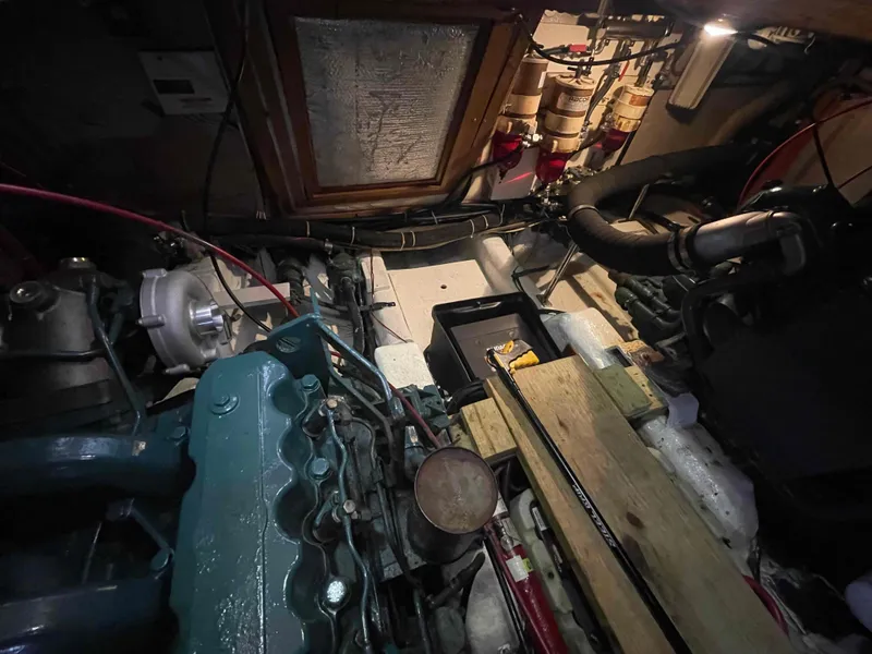 Slide: The Image of Engine room of 1986 Kha Shing Spindrift yacht with machinery and tools. - 47