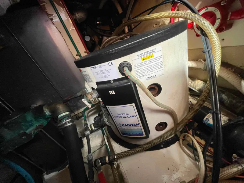 Slide: The Image of Victron Energy MultiPlus charger and inverter on 1986 Kha Shing Spindrift. - 49