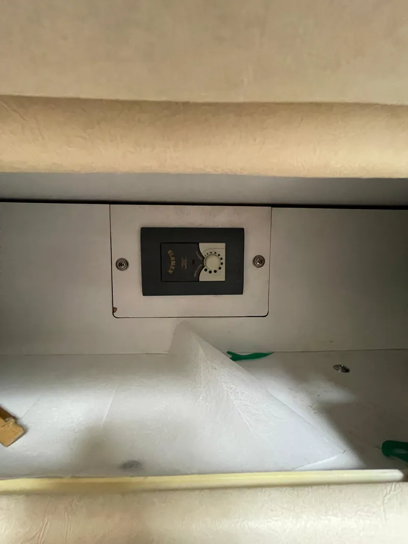 Slide: The Image of Control panel inside 2001 Sea Ray 310 Sundancer boat cabin. - 22