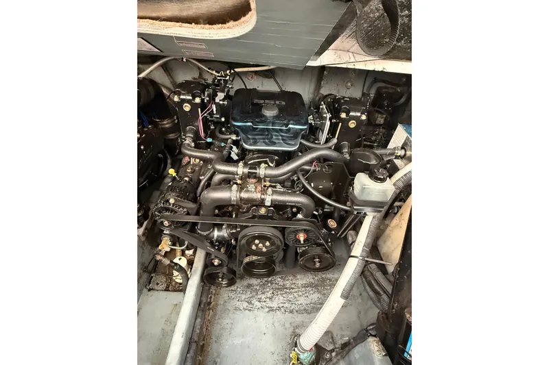 Slide: The Image of Engine compartment of a 2001 Sea Ray Sundancer 310 boat. - 58