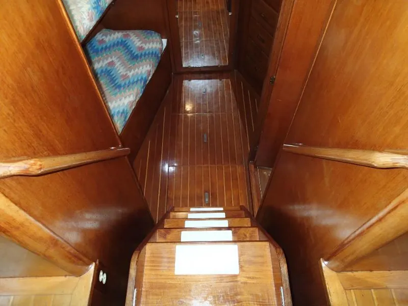 Slide: The Image of Wooden interior stairs of 1987 Tayana 45 Expedition Trawler with polished finish. - 21