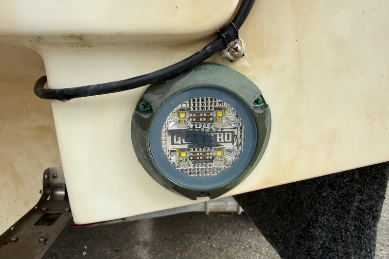 Slide: The Image of Close-up of a 2003 Scout 240 Bay Scout boat light fixture. - 13