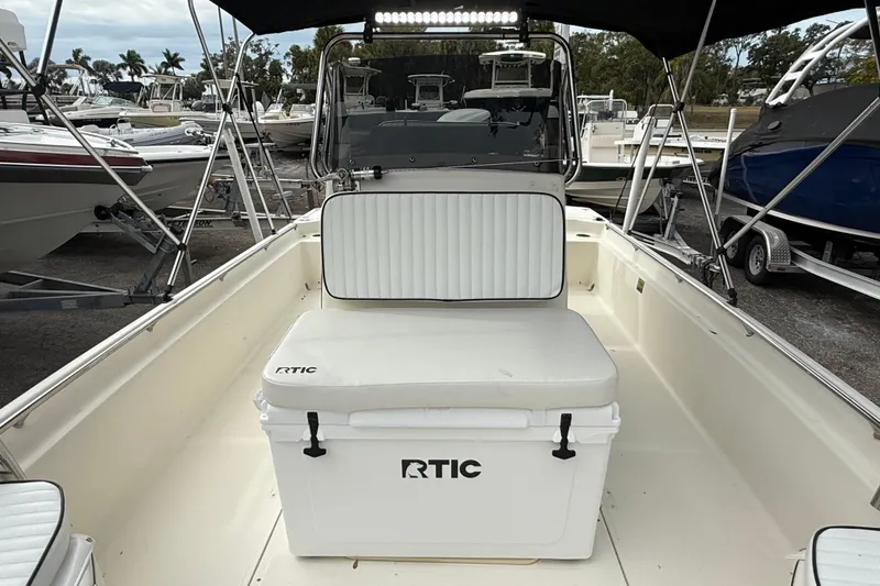Slide: The Image of 2003 Scout 240 Bay Scout boat interior with RTIC cooler and seating. - 40