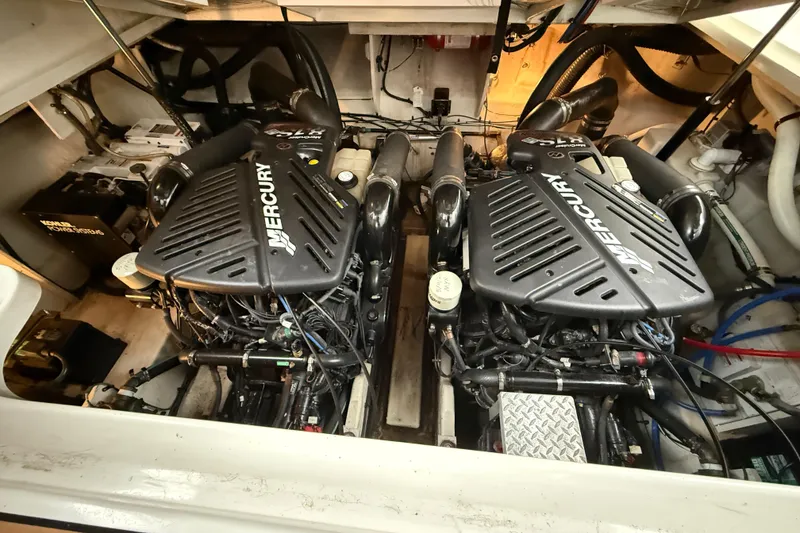 Slide: The Image of Engine room of 2006 Sea Ray 340 Sundancer with twin Mercury engines. - 28
