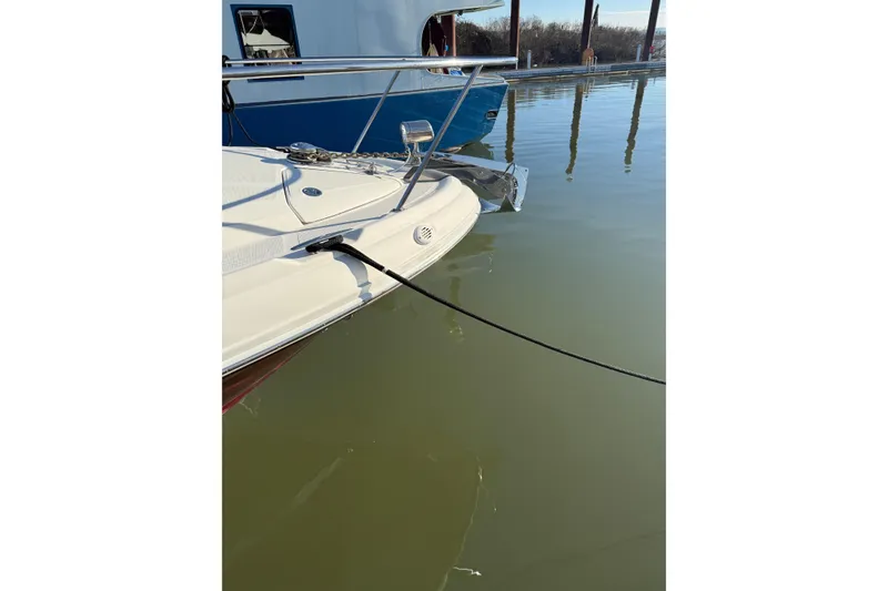 Slide: The Image of 2006 Sea Ray 340 Sundancer docked on calm water. - 6