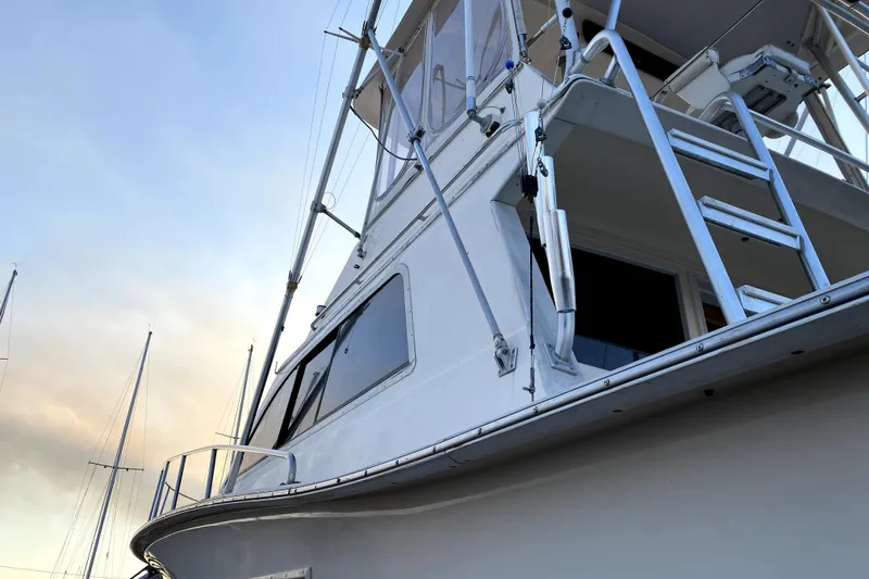 Slide: The Image of 1991 Pacemaker 37 Sportfisherman boat, close-up view of upper deck and ladder. - 24