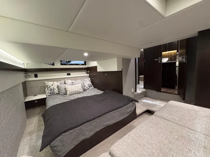 Slide: The Image of Luxurious interior of 2024 Cruisers Yachts 42 Cantius with modern bedroom design. - 14