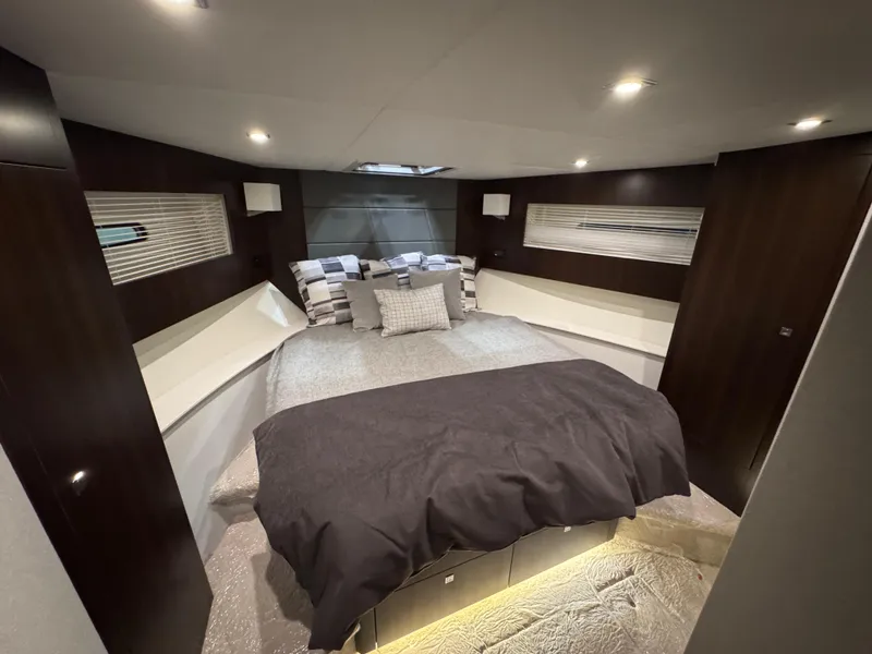Slide: The Image of Luxurious 2024 Cruisers Yachts 42 Cantius cabin with modern design and cozy bedding. - 23