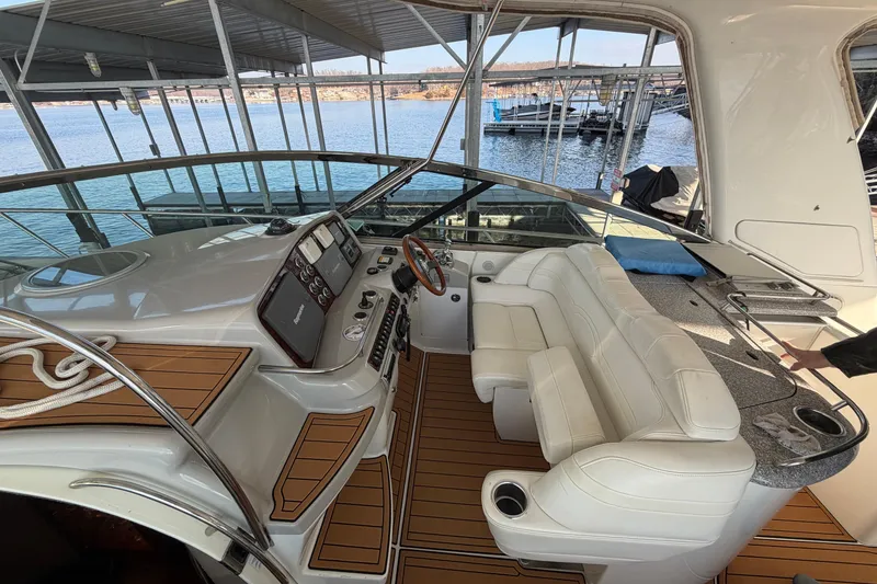 Slide: The Image of Dashboard display of a 2005 Formula 48 Yacht showing engine metrics. - 15