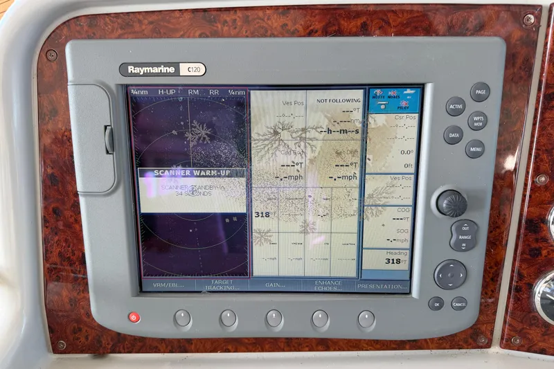 Slide: The Image of Control panel of a 2005 Formula 48 Yacht with warning indicators and switches. - 18