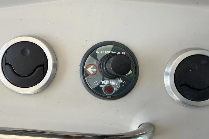 Slide: The Image of Outdoor kitchen area on a 2005 Formula 48 Yacht with grill and seating. - 25