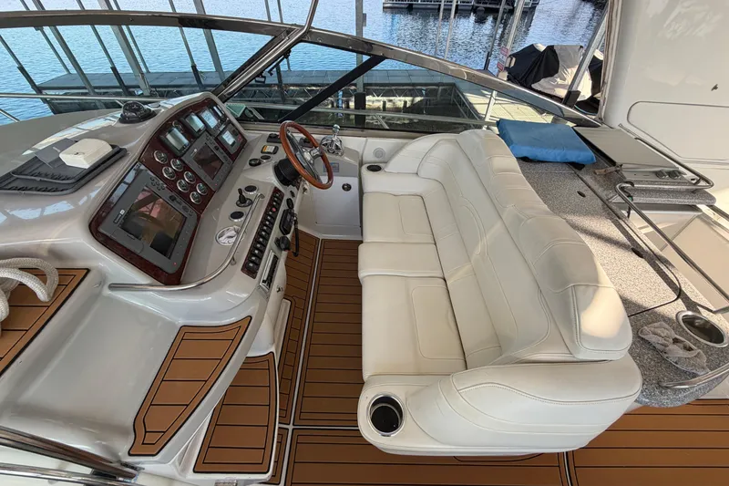 Slide: The Image of Luxurious interior of a 2005 Formula 48 Yacht with modern kitchen and TV. - 29