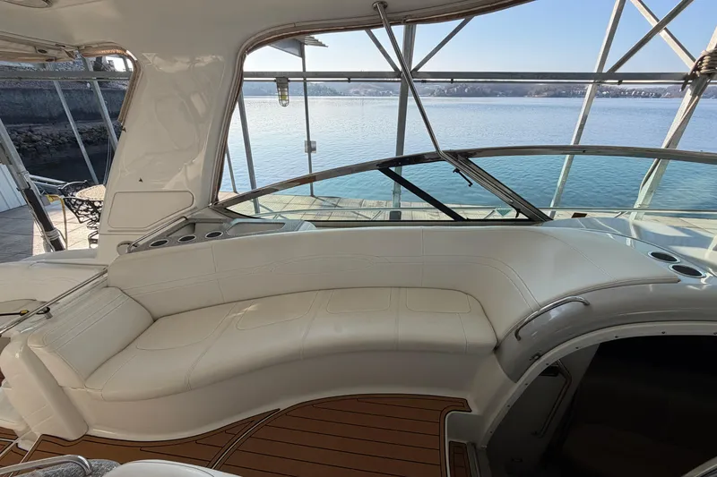 Slide: The Image of Luxurious interior of 2005 Formula 48 Yacht with leather seating and wooden cabinetry. - 30
