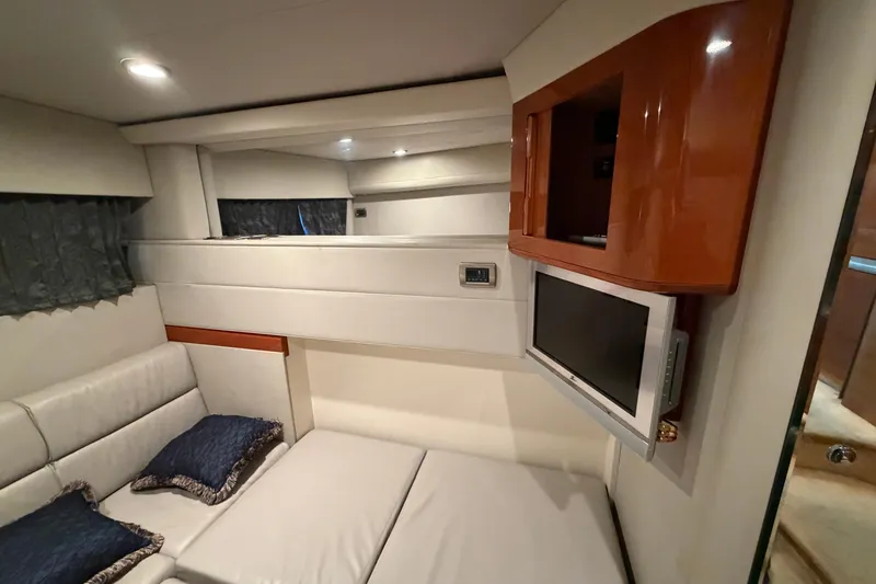 Slide: The Image of Engine room of a 2005 Formula 48 Yacht, showcasing mechanical components and filters. - 41