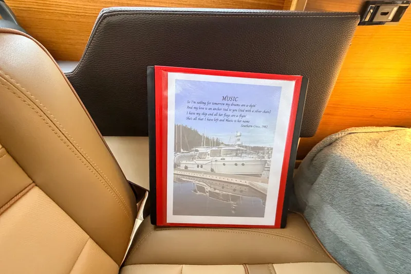 Slide: The Image of Framed poem and boat image on Ranger Tugs R-29 S, 2025 model interior. - 18