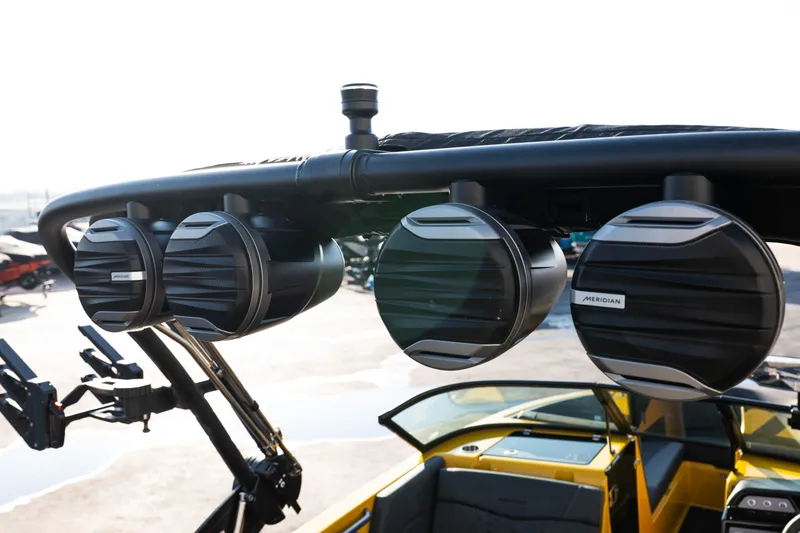Slide: The Image of 2026 MasterCraft NXT23 boat with Meridian speakers on the wakeboard tower. - 11