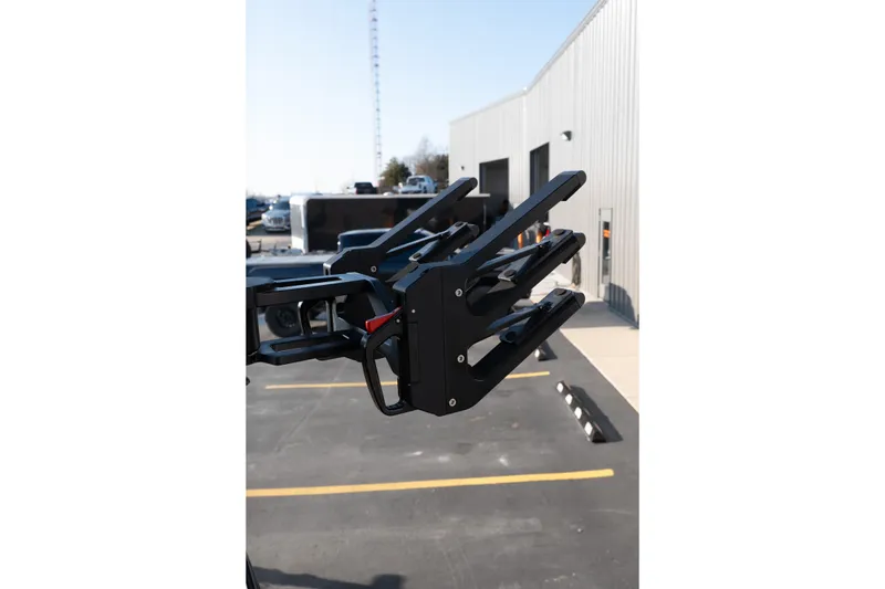 Slide: The Image of 2026 MasterCraft NXT23 boat accessory detail in a parking lot setting. - 35