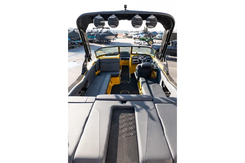 Slide: The Image of 2026 MasterCraft NXT23 boat interior with sleek seating and modern design. - 9