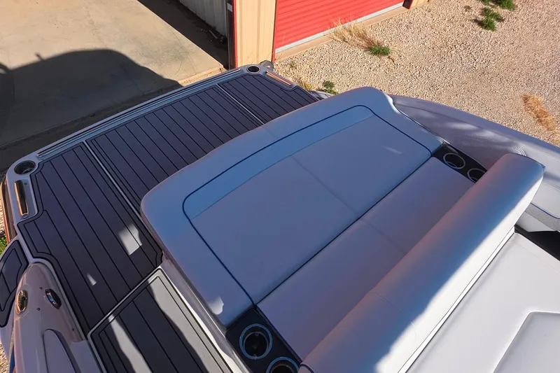 Slide: The Image of 2021 Formula 270 Bowrider boat with sleek seating and deck design. - 10