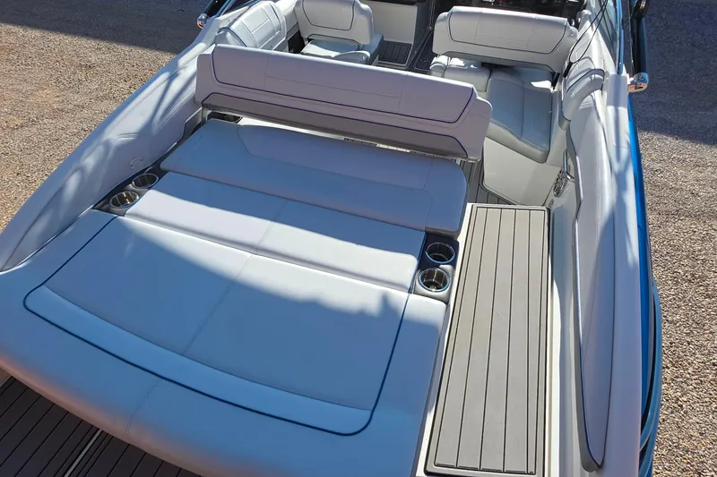 Slide: The Image of 2021 Formula 270 Bowrider interior with spacious seating and cup holders. - 12