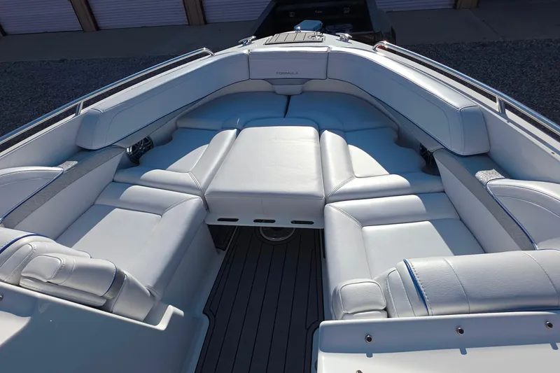 Slide: The Image of 2021 Formula 270 Bowrider boat interior with luxurious white seating and spacious layout. - 21