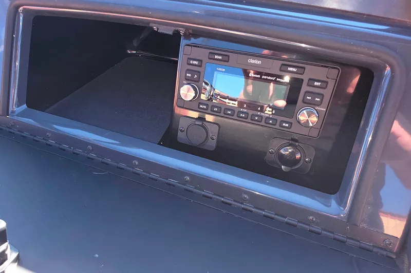 Slide: The Image of Dashboard of 2021 Formula 270 Bowrider featuring a Clarion audio system. - 32