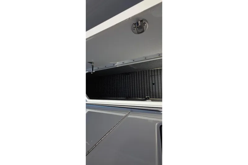 Slide: The Image of Open storage compartment on a 2021 Formula 270 Bowrider boat. - 39