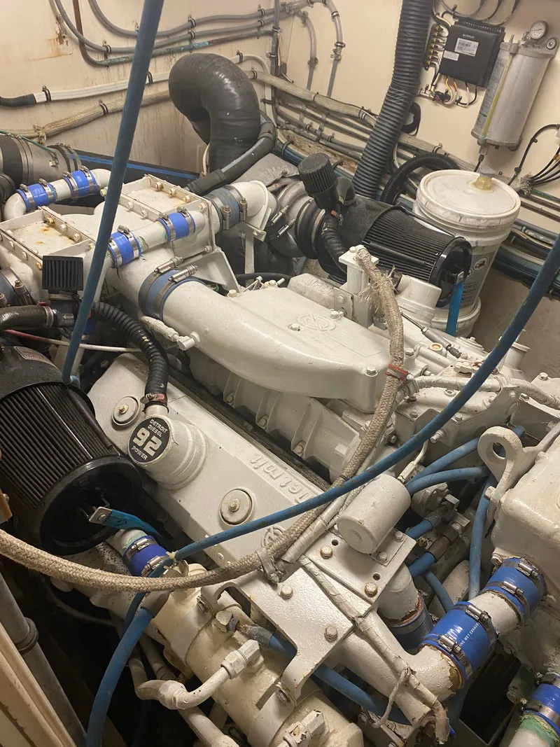 Slide: The Image of Engine room of 1987 Hatteras 54 Motoryacht with visible mechanical components. - 40